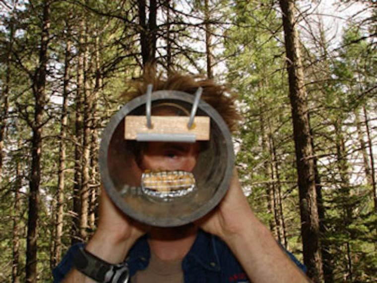 Jessen holds hair snare up to his face